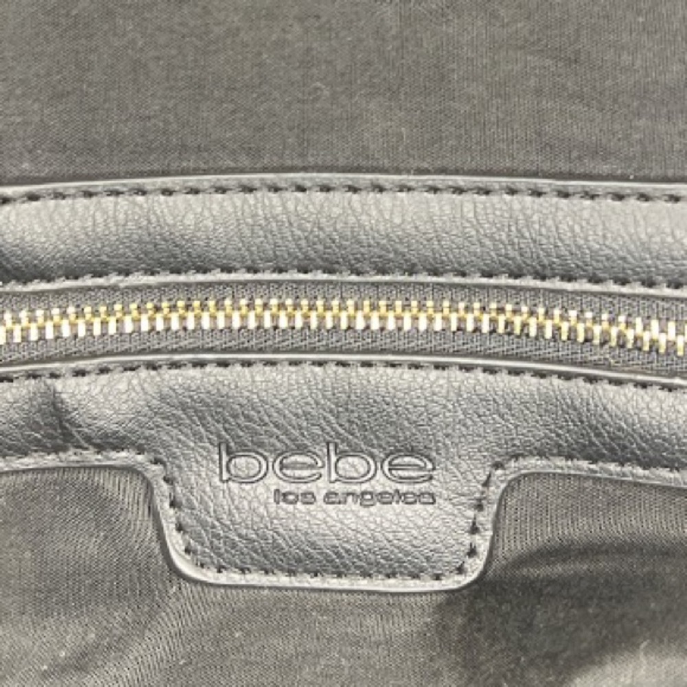 Bebe Colette Tripe entry bag. Gold tone hardware. - Picture 8 of 9